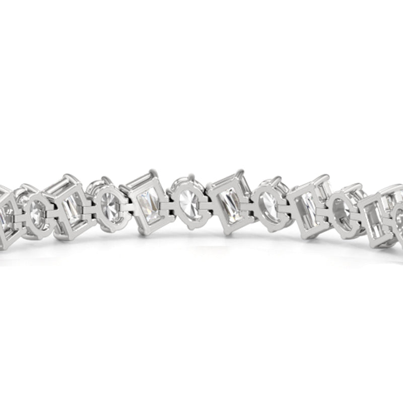Oval and Emerald Herringbone Tennis Bracelet