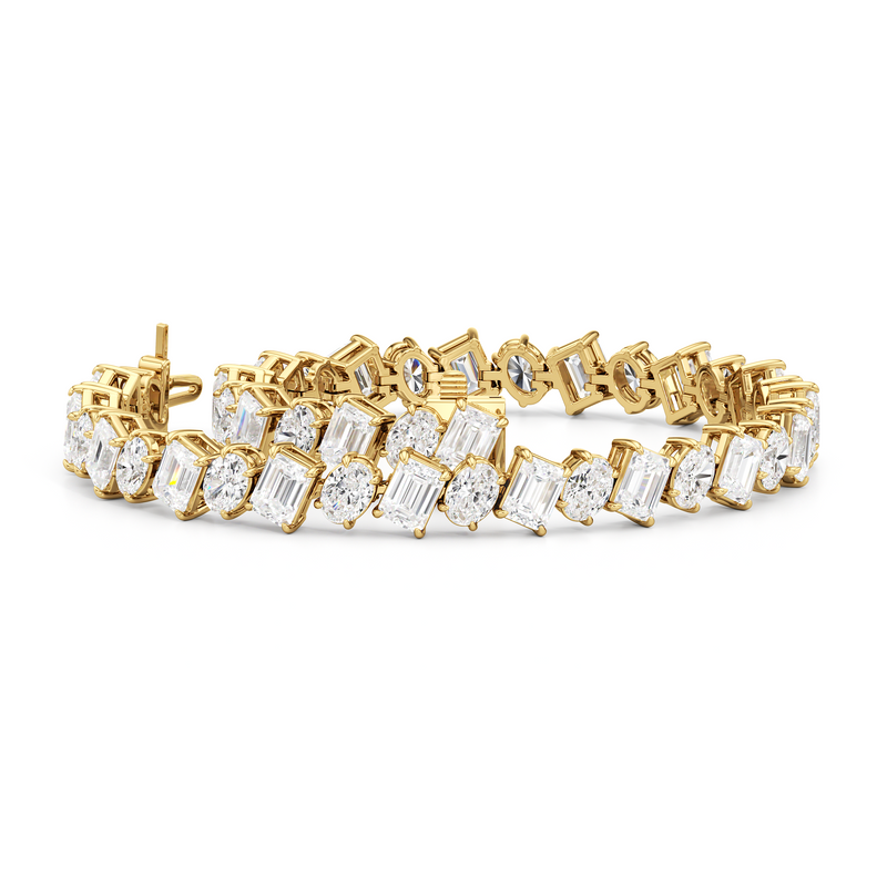Oval and Emerald Herringbone Tennis Bracelet