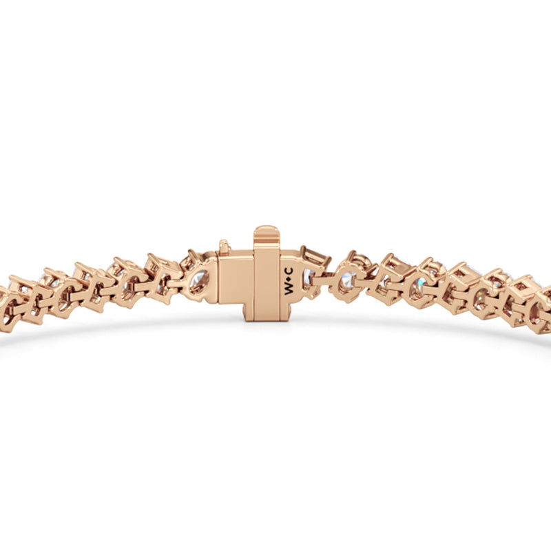 Oval and Emerald Herringbone Tennis Bracelet