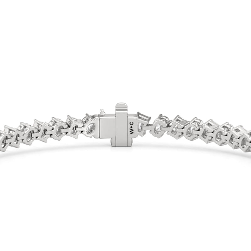 Oval and Emerald Herringbone Tennis Bracelet