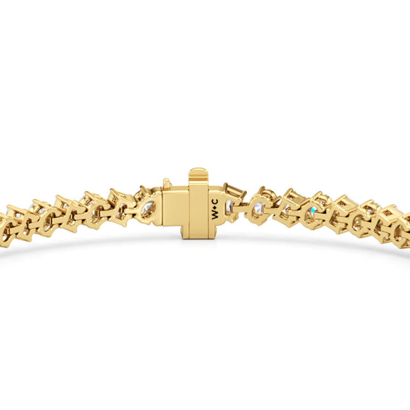 Oval and Emerald Herringbone Tennis Bracelet