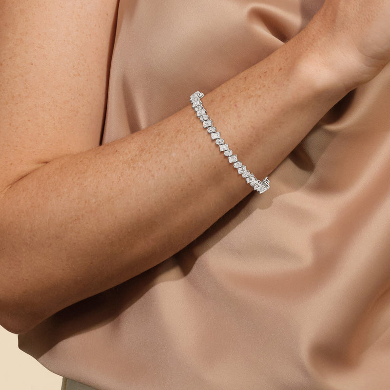 Oval and Emerald Herringbone Tennis Bracelet
