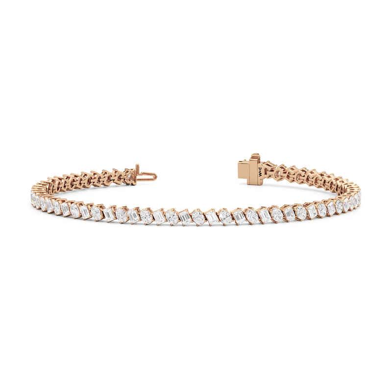 Oval and Emerald Herringbone Tennis Bracelet
