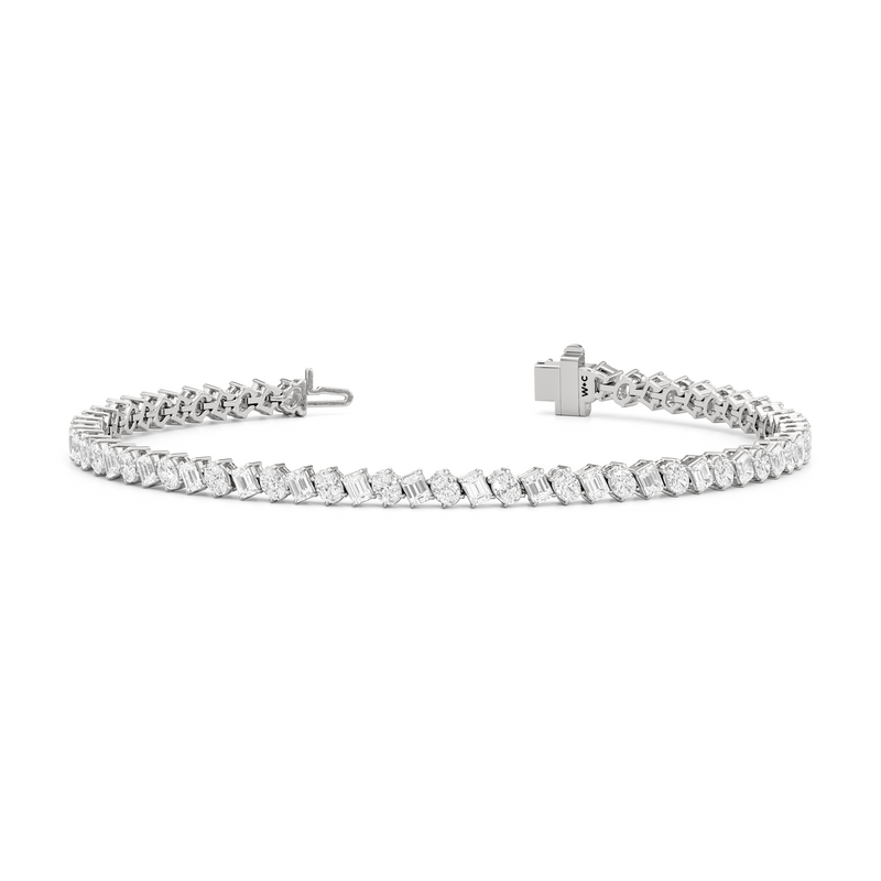 Oval and Emerald Herringbone Tennis Bracelet