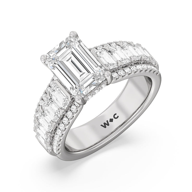Emerald Side Stone Broad Band Hidden Halo Engagement Ring