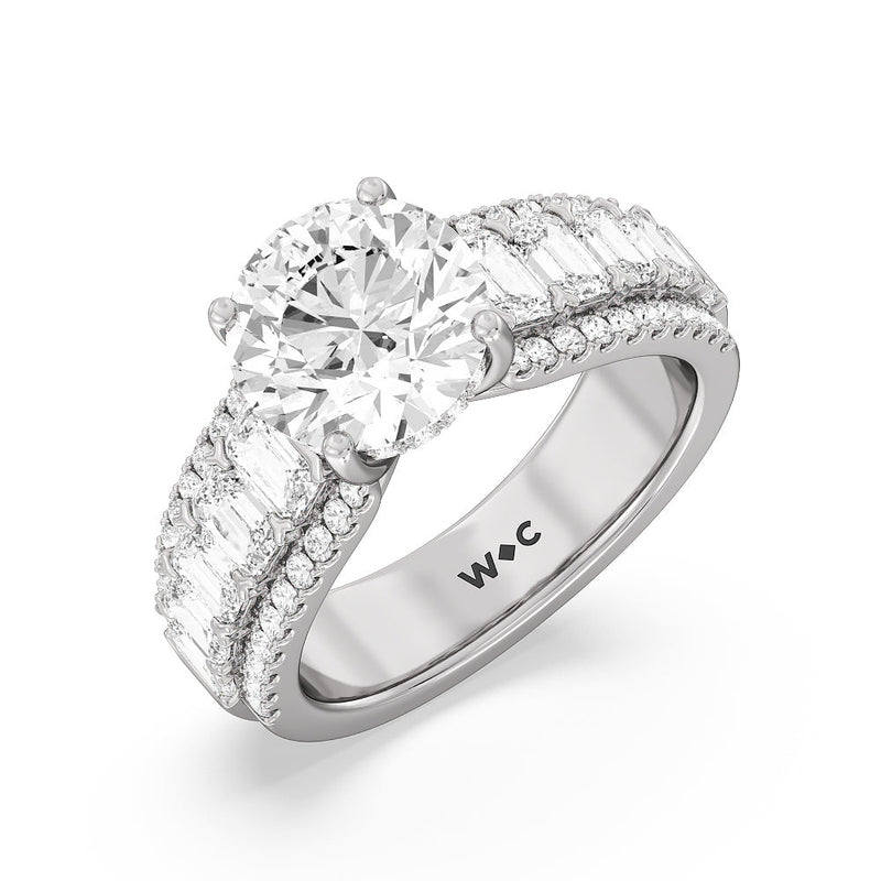 Emerald Side Stone Broad Band Hidden Halo Engagement Ring