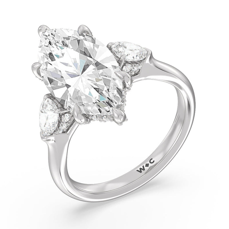 Elegance Pear Side Stone Engagement Ring (E+ VVS+)