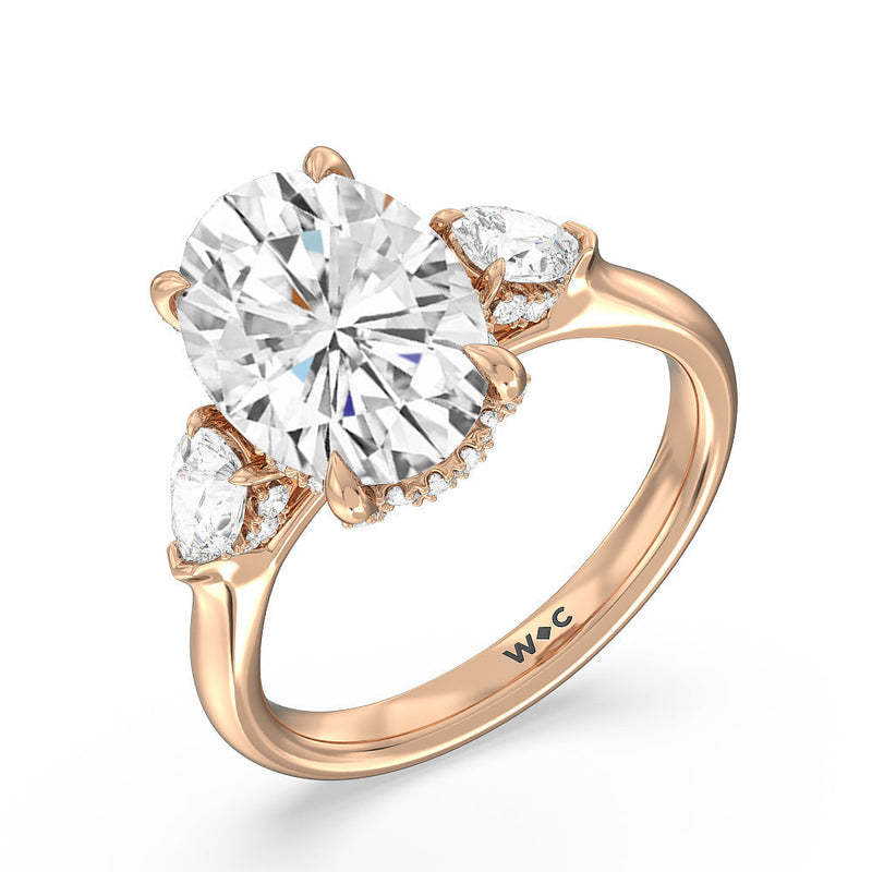 Elegance Pear Side Stone Engagement Ring (E+ VVS+)
