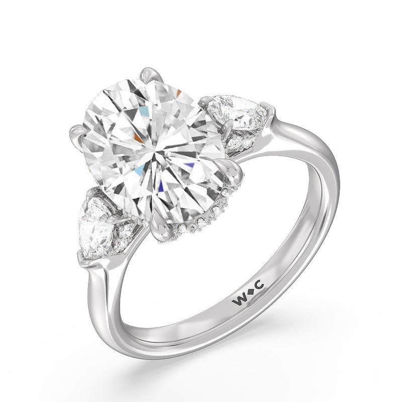Elegance Pear Side Stone Engagement Ring (E+ VVS+)