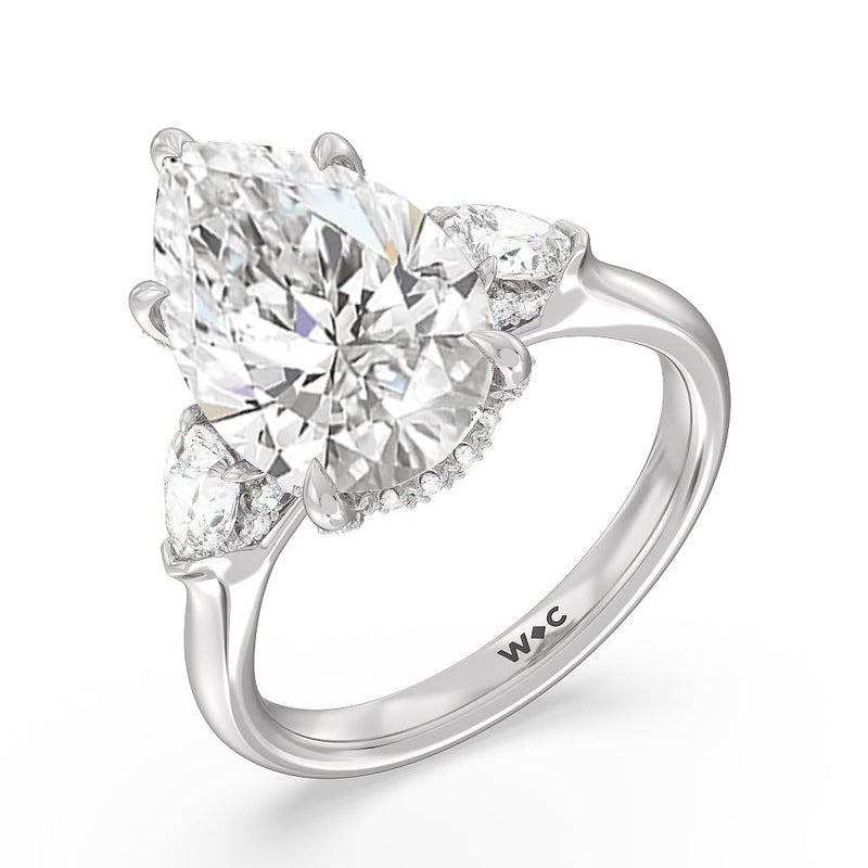 Elegance Pear Side Stone Engagement Ring (E+ VVS+)