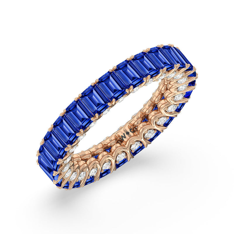 Created Sapphire Emerald Split Prong Basket Eternity Ring