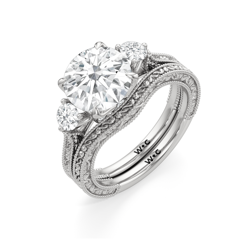 The Seraphine Round Three Stone Wedding Band