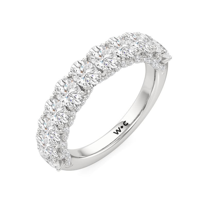 The Roosevelt Three Stone Diamond Wedding Band